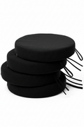 Black round chair pads hero on white